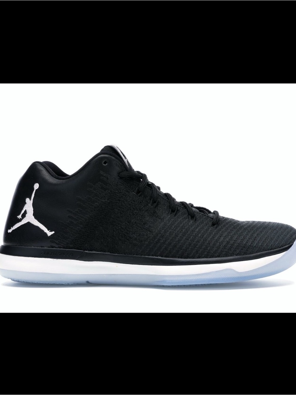 Jordan Black and White Low-Top Basketball Shoe